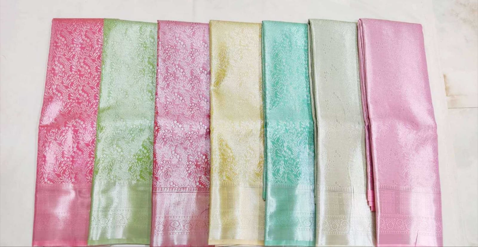 Soft pastel shades with subtle sheen
